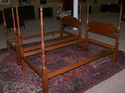 Matched pair of solid cherry Virginia Craftsman twin poster beds 