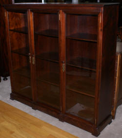 Mahogany antique inlaid 1920s triple glass door bookcase