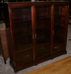 Mahogany antique inlaid 1920s triple glass door bookcase