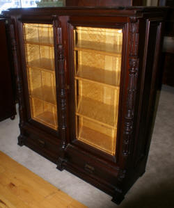 eastlake Victorian solid walnut antique beveled glass door bookcase