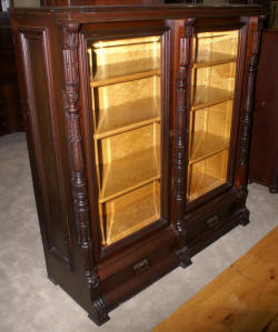 eastlake Victorian solid walnut antique beveled glass door bookcase