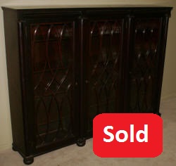 Empire Revival mahogany triple glass door bookcase