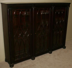 Empire Revival mahogany triple glass door bookcase