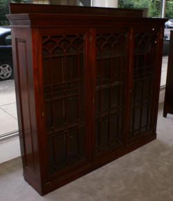 Triple door solid mahogany antique bookcase