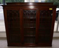 Triple door solid mahogany antique bookcase