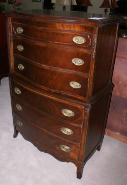 mahogany serpentine front high chest