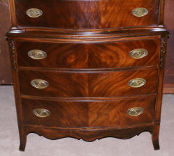 mahogany serpentine front high chest
