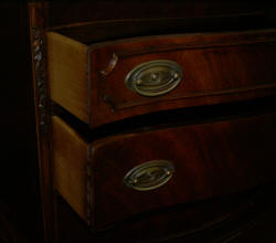 mahogany serpentine front high chest