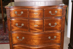 Serpentine front mahogany antique chest