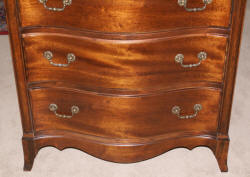 Serpentine front mahogany antique chest