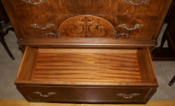 walnut antique inlaid French carved chest of drawers