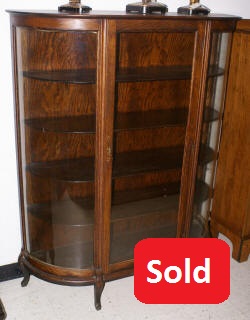 Solid oak antique bow glass china cabinet
