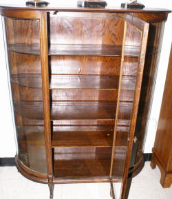 Solid oak antique bow glass china cabinet