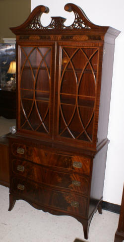 Mahogany inlaid bow front china cabinet