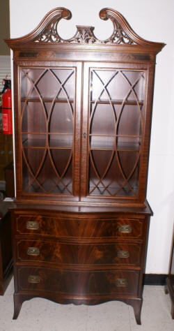 Mahogany inlaid bow front china cabinet