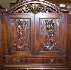 walnut heavily carved antique blind door crystal cabinet with built in butlers desk