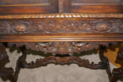 walnut heavily carved antique blind door crystal cabinet with built in butlers desk