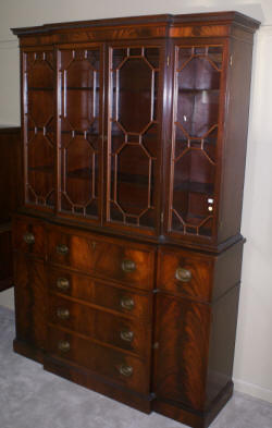 two piece mahogany breakfront china cabinet with butlers desk