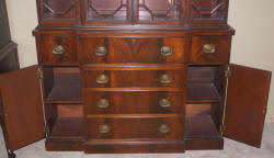 two piece mahogany breakfront china cabinet with butlers desk