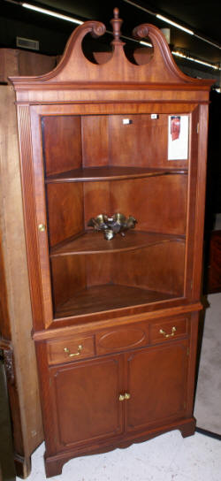 One door mahogany corner cabinet