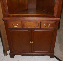 One door mahogany corner cabinet