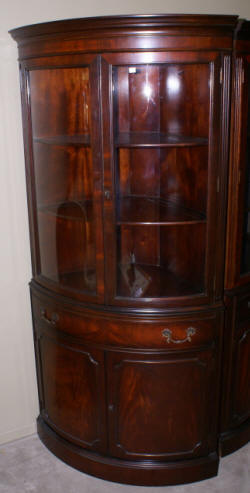 bow front mahogany corner cabinet