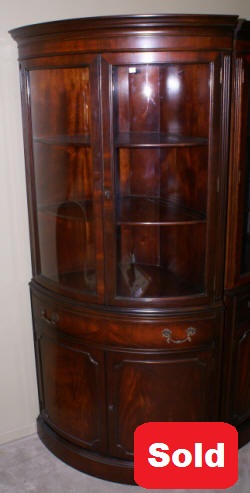 bow front mahogany corner cabinet