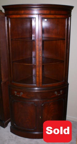 bow front mahogany corner cabinet