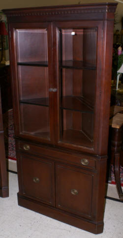 Beveled glass dark mahogany corner cabinet