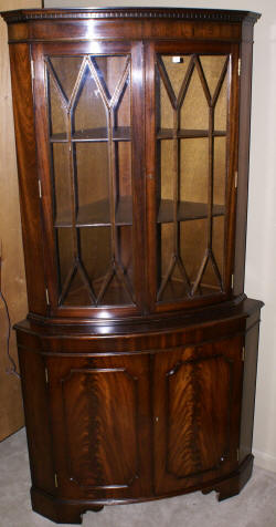 English flame mahogany antique corner cabinet