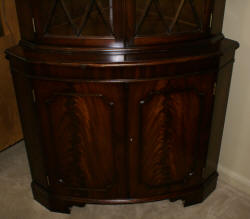English flame mahogany antique corner cabinet