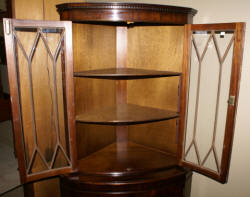 English flame mahogany antique corner cabinet