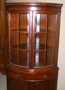 Drexel Travis Court Collection mahogany bow front corner cabinet