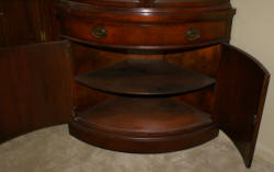 Drexel Travis Court Collection mahogany bow front corner cabinet