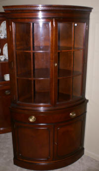 Matched pair of Drexel mahogany corner cabinets