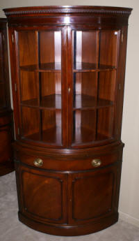 Matched pair of Drexel mahogany corner cabinets