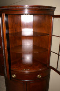 Matched pair of Drexel mahogany corner cabinets