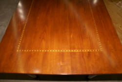 Banded inlaid mahogany bow front desk