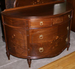 Walnut French flower inlaid carved antique demi- lune dresser