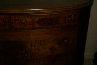 Demi-lune walnut inlaid antique dresser