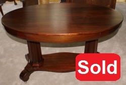 empire revival oval mahogany library table