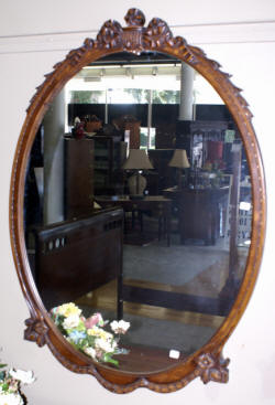 oval walnut french carved mirror