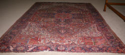 Handmade Persian Heriz worn antique rug 