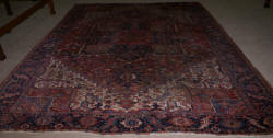 Handmade Persian Heriz worn antique rug 