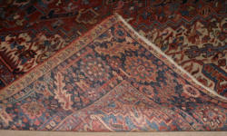 Handmade Persian Heriz worn antique rug 