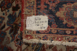 Handmade Persian Heriz worn antique rug 