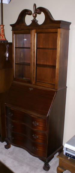 mahogany antique serpentine front secretary desk