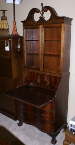 mahogany antique serpentine front secretary desk