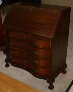 Antique mahogany serpentine front mahogany governor Winthrop desk 