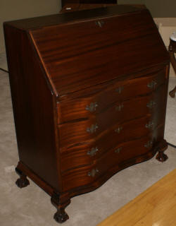 Antique mahogany serpentine front mahogany governor Winthrop desk 